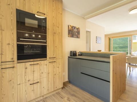 Wood, Flooring, Kitchen, Interior Design, Cabinetry, Countertop, Floor, Furniture, Home Appliance, Wood Flooring