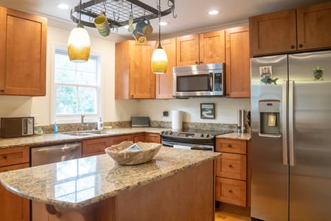 Modern kitchen for cooking meals when not dining at Ocean Springs hotspots 