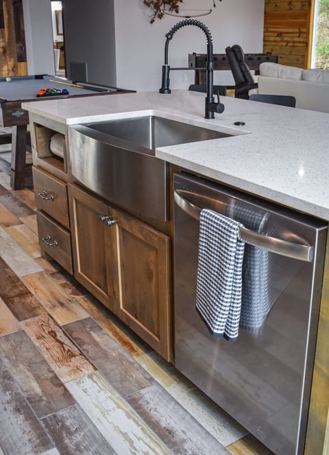 Enjoy the big farm style sink and dishwasher, giving you more relax time.