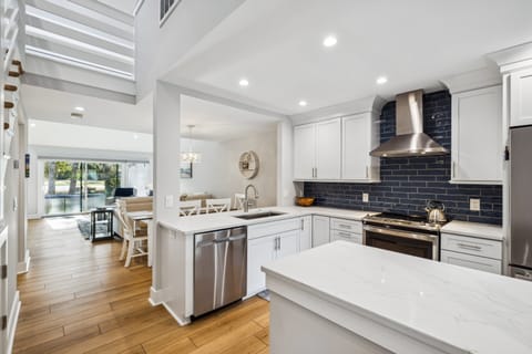 Fully stocked kitchen with stainless steel appliances