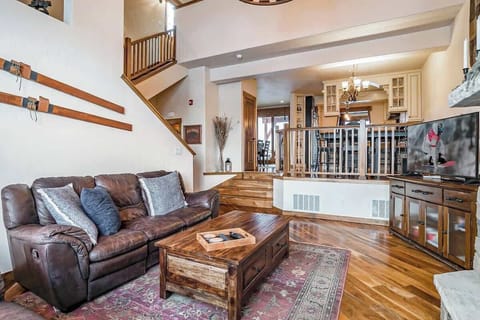 Connect, relax, and recharge—this cozy living space flows seamlessly into the kitchen and dining area, perfect for après-ski hangouts.