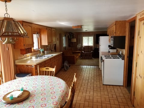 VIEW FROM DINING ROOM LOOKING AT THE LIVING ROOM