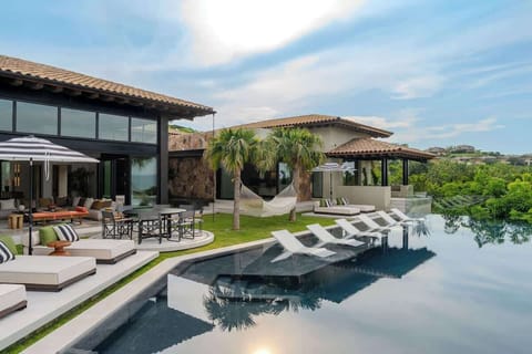 Las Casitas is a remarkable beachfront property located in the exclusive Kupuri community of Punta Mita, featuring three separate casitas.