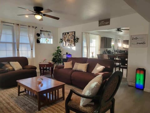 Reclining Couch and chair, Fireplace and 60in w/ Roku karaoke bluetooth speaker. Slingshot available for rent see in photos