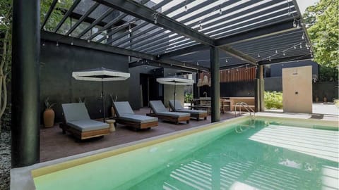 Community Pool with Sun Loungers