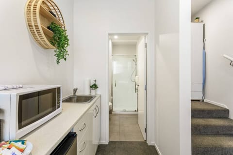 The kitchenette has a microwave and beer fridge.