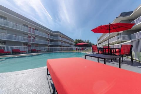 Stretch out poolside under bold umbrellas and warm breezes.