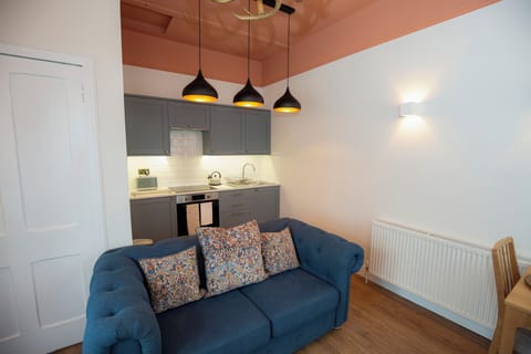 Kitchen, living room, dining area.