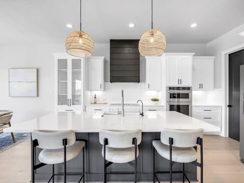 Large kitchen with Kitchen Aid Appliances and Island