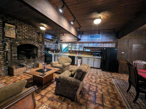 The Cafeteria has a refrigerator and freezer, dishwasher, and a smart TV.