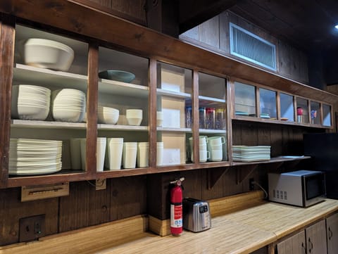 The Cafeteria's fully-stocked kitchen area includes a gas oven and stovetop.