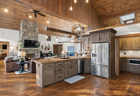 The open-concept layout flows seamlessly, connecting the kitchen, dining, and living areas for effortless gatherings.