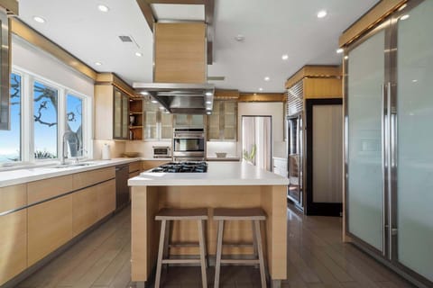 Natural light enhances every detail, from the backsplash to the fixtures.