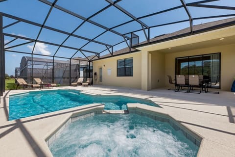 This Florida vacation home is the perfect retreat, featuring a luxurious spa that's ideal for unwinding and rejuvenating after a fun-filled day at Disney.