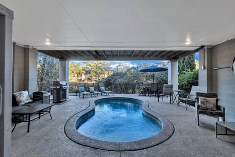 The private pool deck is perfect for lounging or entertaining.