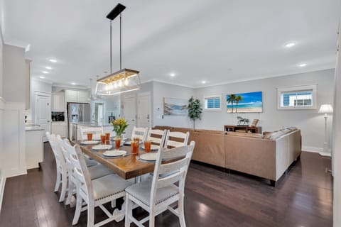 Indoor dining table with seating for 8, plus kitchen island seating for 4