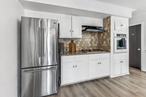 Fully stocked kitchen with all major appliances, and pots/pans, untinsils, etc.