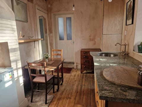 Living area leading to private ensuite shower room and toilet.