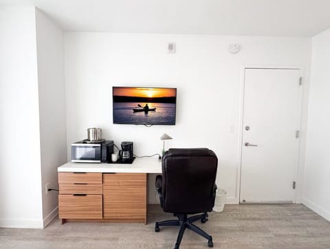 Studio with TV and amenities