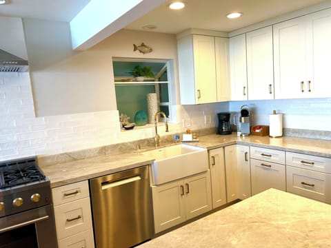 Brand-new kitchen fully stocked and ready for your favorite meals.