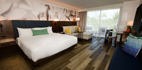 Stretch out in a sunlit bedroom designed for total relaxation.