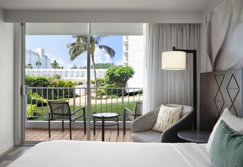 Wake up to palm breezes and step onto your balcony.