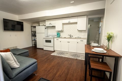 Studio style living room w/ double sofa bed, study desk, full kitchen w/ Keurig