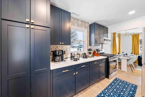 Whip up your favorites and wind down with a drink in our stylish galley kitchen! Enjoy a variety of beverage options with a French press, drip coffee machine, Keurig, Moka pot, and Fire electric kettle. Featuring a gas stove, dishwasher, Smeg toaster, and Henckels knife set, this space is ready for all your culinary adventures.