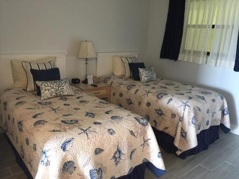 Bedroom. Exact unit will be assigned upon arrival. Views, colors and decor may vary.