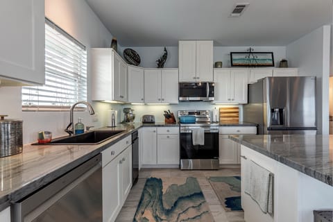 This fully equipped kitchen has everything needed to create delicious memories.