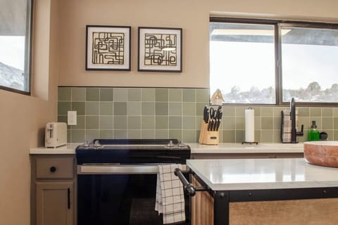 Kitchen includes full size oven and 4 burner stove