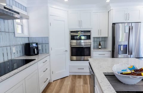 Door leads to walk-in pantry