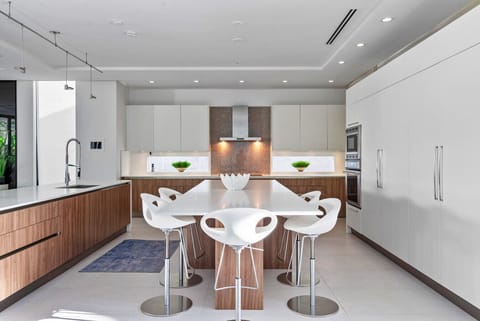 Wall of cabinetry plus high end range and hood