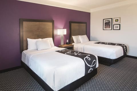 Settle into a spacious double-queen room made for sharing.
