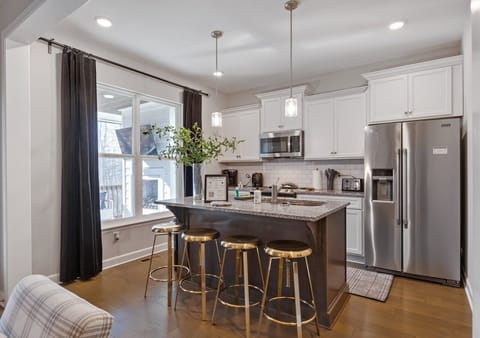 Enjoy cooking a homemade meal while chatting with your guests in the spacious kitchen.