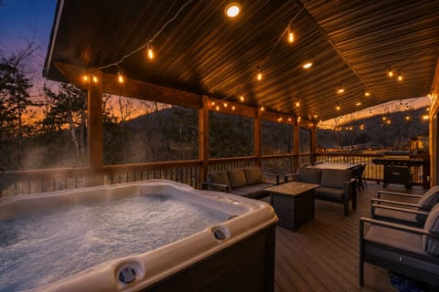 Oversized Deck with a NEW Hot Tub, Propane Fire Table, Seating, and Twinkle Lights