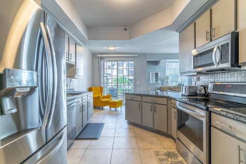 Gourmet kitchen with access to one of the balconies