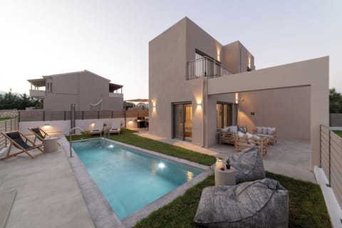 KS Si Villa - Outdoor space with swimming pool, seating area and BBQ facilities