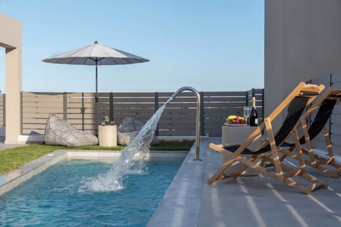 KS Si Villa - Outdoor space with swimming pool, seating area and BBQ facilities