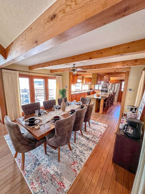 Enjoy meals together in this expansive dining space, complete with seating for everyone and beautiful lake views.