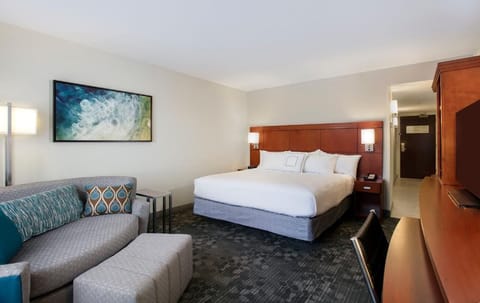 Stretch out on the sofa after sinking into crisp linens.