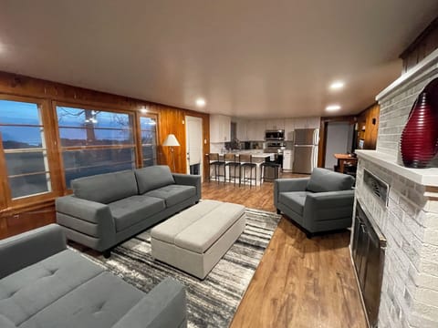 Living room
The ottoman opens up to a cot.