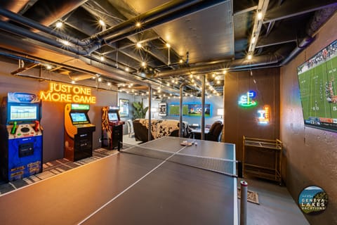 Best recreation room ever! Arcade, ping-pong, 3 smart TVs, leather sofa seating.