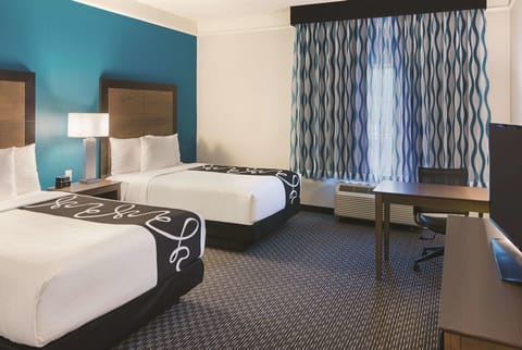 Settle into two plush queens for a restful night.