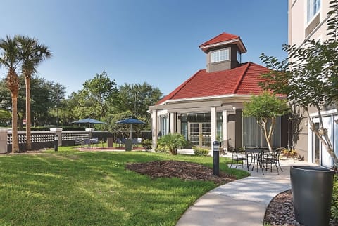 Stroll the landscaped courtyard and unwind on the shaded patio.
