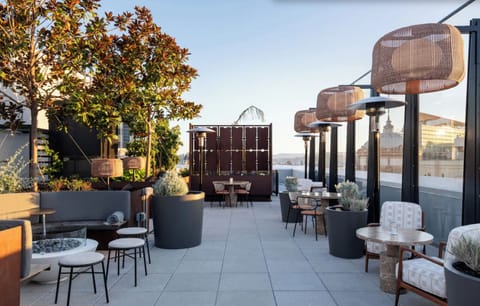 Linger over sunset cocktails on the plant-filled rooftop terrace.