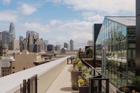 Breathe in skyline views along a breezy rooftop walkway.