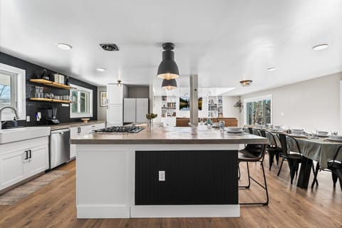 The brand new concrete countertops give the kitchen a modern touch