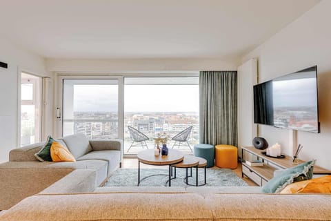 Bright, modern living room with stunning city views