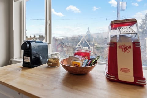 Premium nespresso coffee maker and popcorn maker for snacking included!